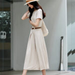 Workplace temperament: Round neck, waist cinched sweater dress