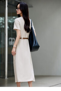 Workplace temperament: Round neck, waist cinched sweater dress