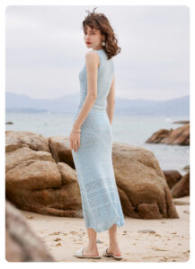 Fashionable wave hollowed out sleeveless long sweater dress