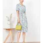 Acetic acid printed dress with elegant waist cinching design