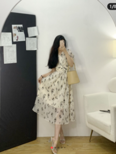 MeetMetro mid length waist cinched floral dress