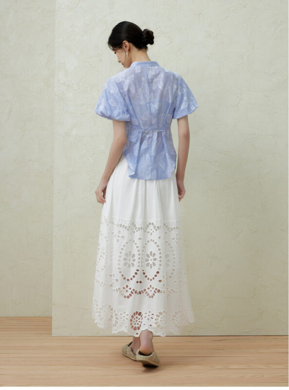 Romántico francés con encaje hueco en verano, cintura elástica, falda grande en forma de a, falda de medio cuerpo
