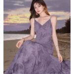 Seaside vacation elegant large swing V-neck floral suspender dress