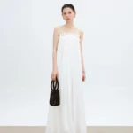 Hollow out lace style spliced large skirt suspender dress