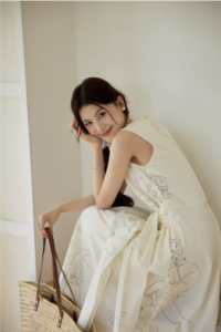 Printed round neck sleeveless lace up cream yellow dress