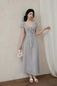 Three dimensional pleated lotus leaf edge dynamic chiffon dress