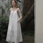 Hollow out flower shaped hand woven shoulder strap sling skirt