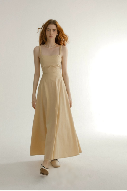 Wearing a camisole dress with a backless mini skirt and a French dress