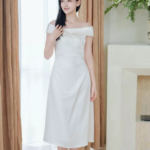 One shoulder white A-line waist cinched dress