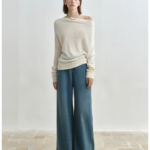 Flat shoulder pile neck knitted sweater with bat sleeves for women