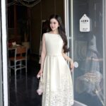 One neck acetic acid sleeveless dress with lace patchwork long skirt