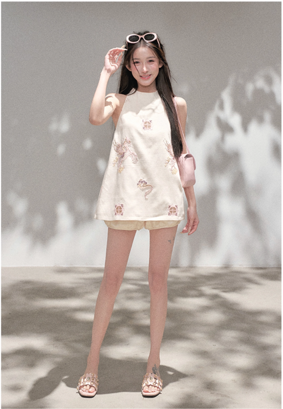 Embroidered sleeveless halter dress