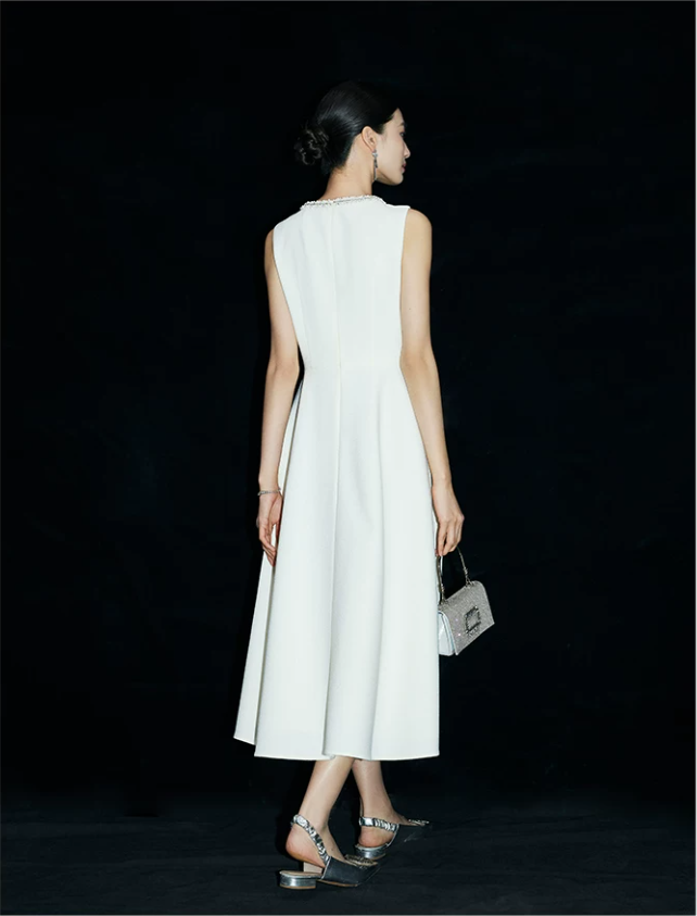 Beaded Audrey Hepburn-style white dress Beaded Audrey Hepburn-style white dress