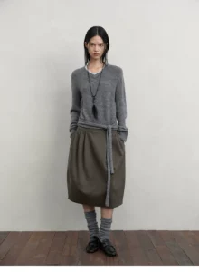 Color collision fake two-piece tie ribbon knit sweater