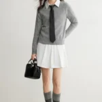 Seamless one-piece semi high neck sweater