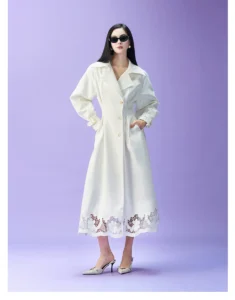Original design: Heavy industry hollowed out flower embroidery waist cinching white long windbreaker