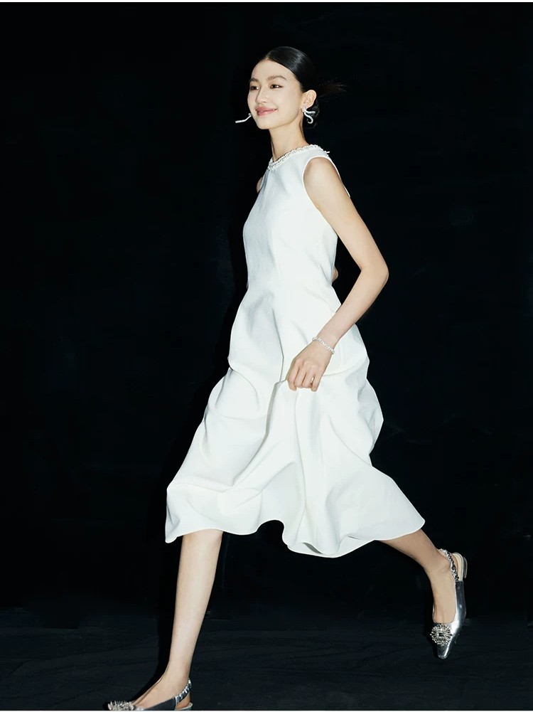 Beaded Audrey Hepburn-style white dress Beaded Audrey Hepburn-style white dress