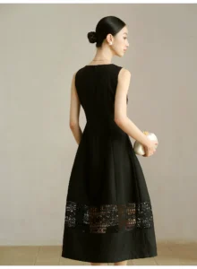 Exquisite lace hollowed out sleeveless dress with a large swing style