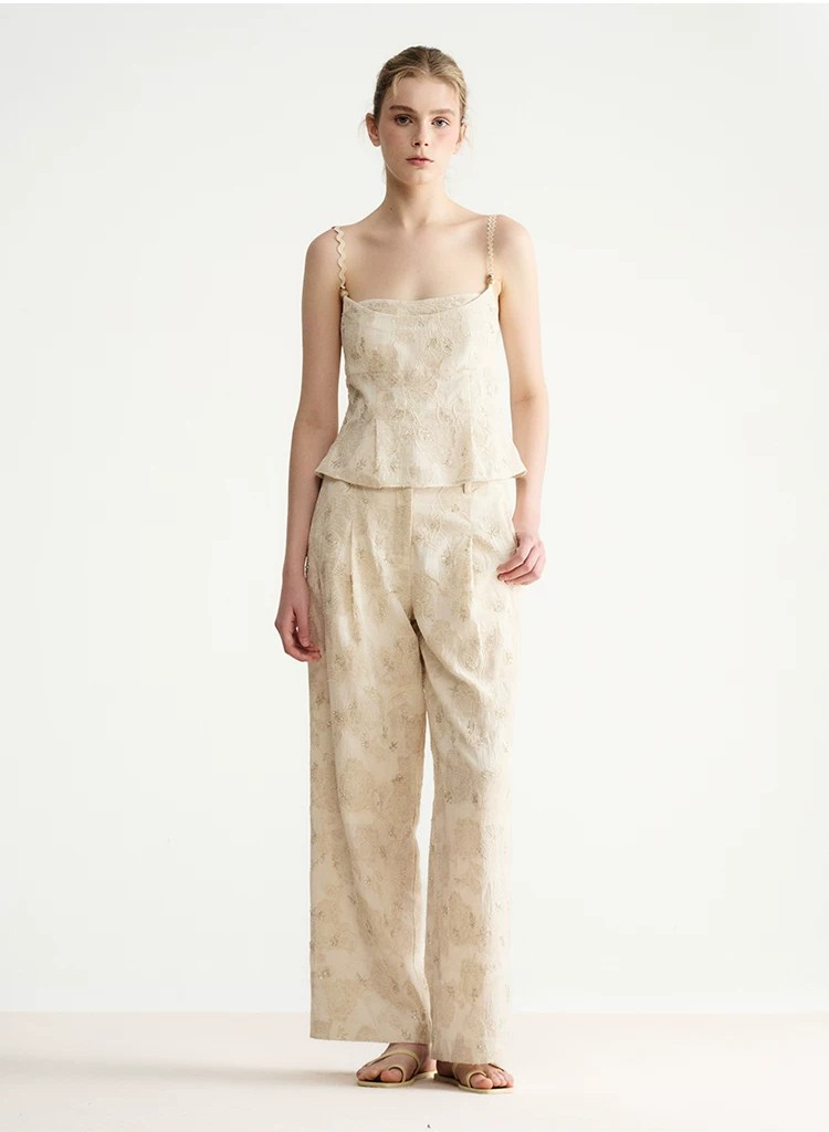 Embroidered asymmetrical top with wavy shoulder straps and beaded fake two-piece straps Embroidered asymmetrical top with wavy shoulder straps and beaded fake two-piece straps