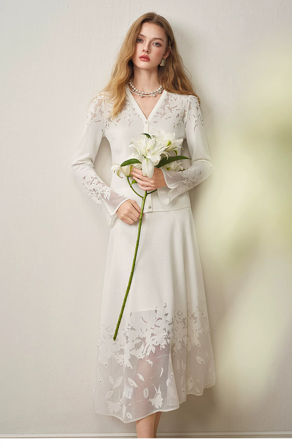 Spring New Hollow Jacquard Cardigan Skirt Set Spring New Hollow Jacquard Cardigan Skirt Set