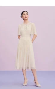 Spring and summer new French V-neck pleated long skirt